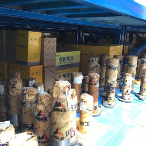 ắc bạc máy xúc lật